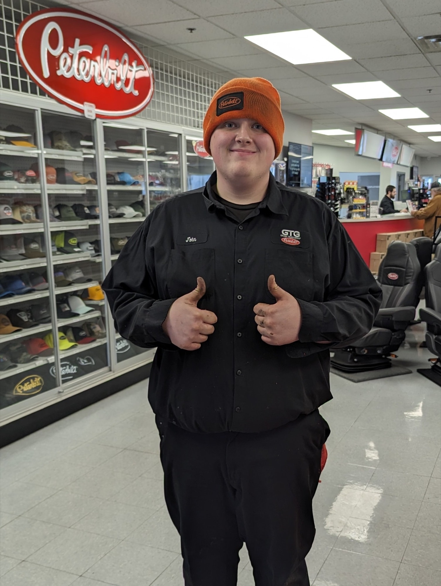 GTG Peterbilt team member wearing branded company apparel