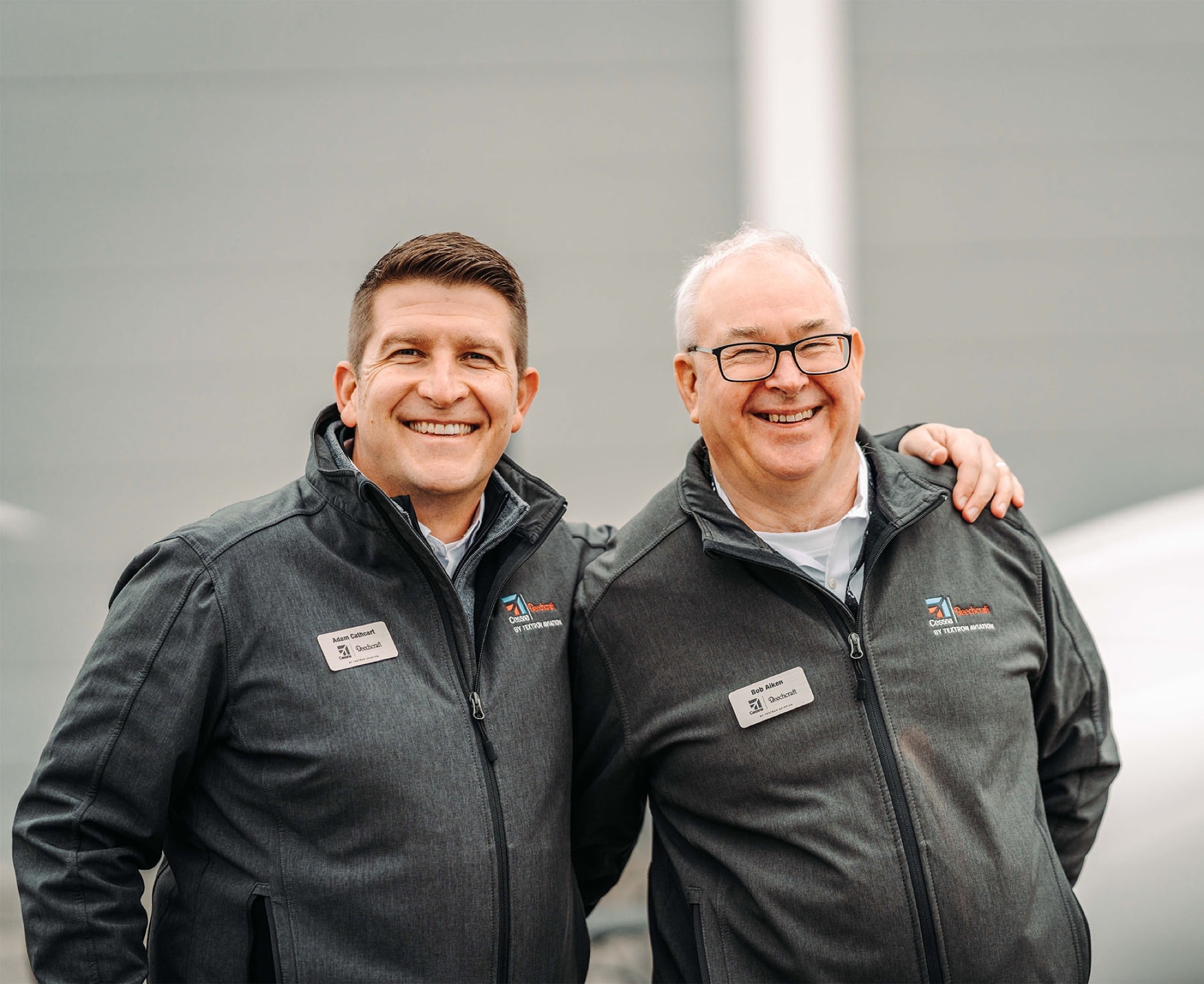 Textron Aviation employees in coordinated branded apparel