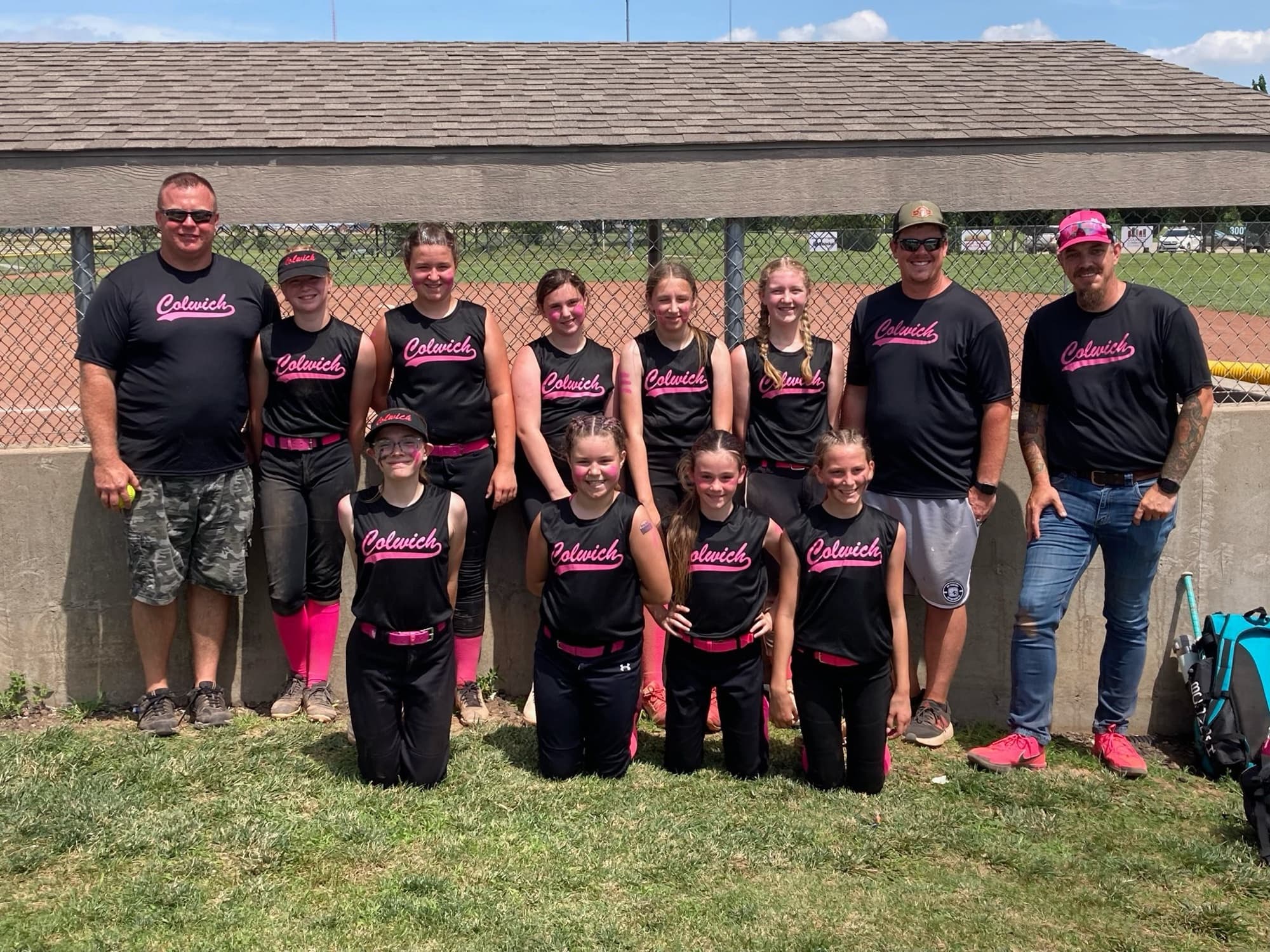 Colwich Ball Club team in matching printed shirts