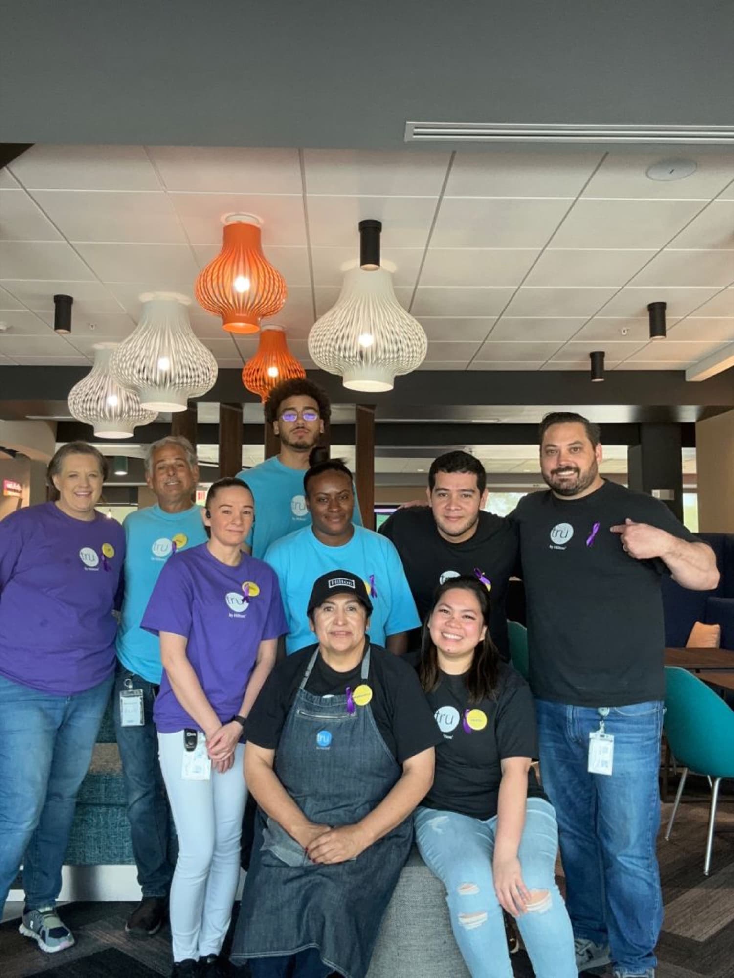 Hilton staff in branded team apparel